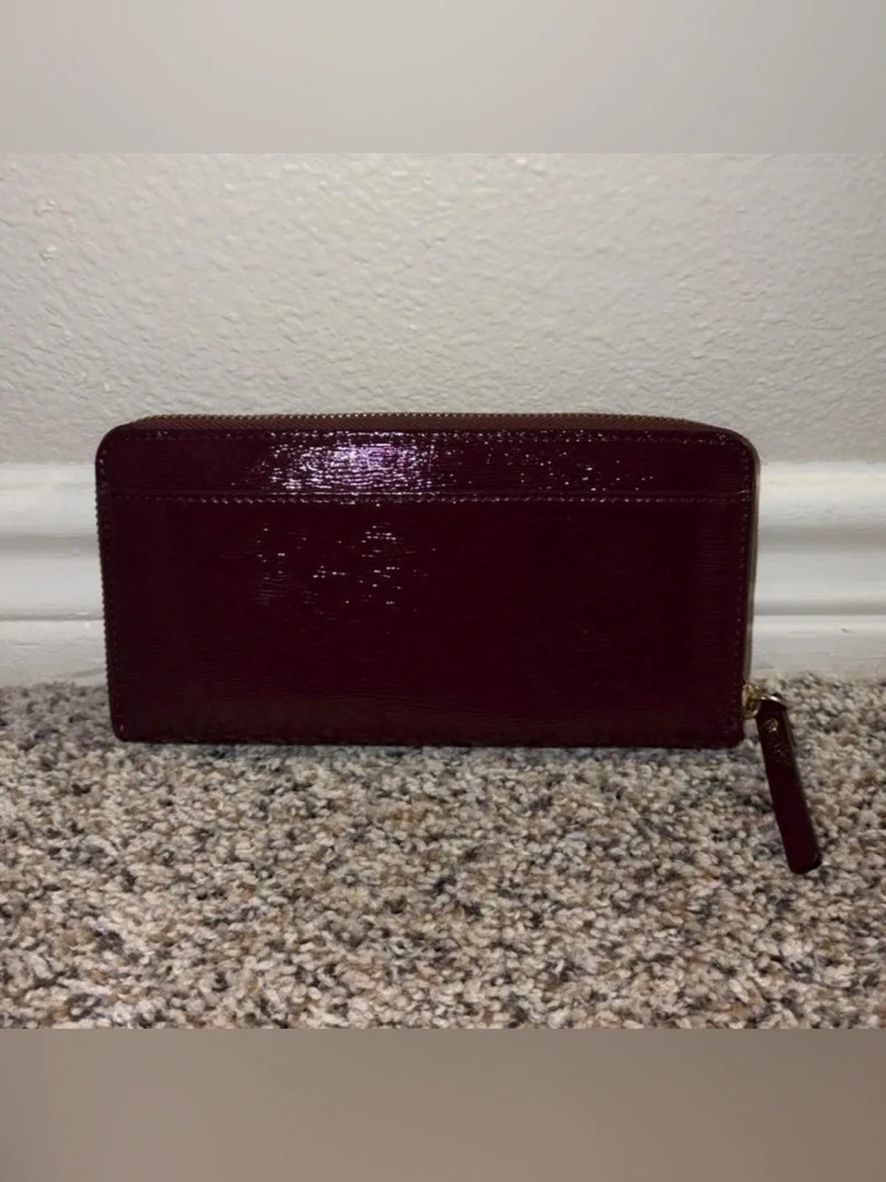 kate spade Burgundy Patent Zip-Around Wallet with Gold Plaque